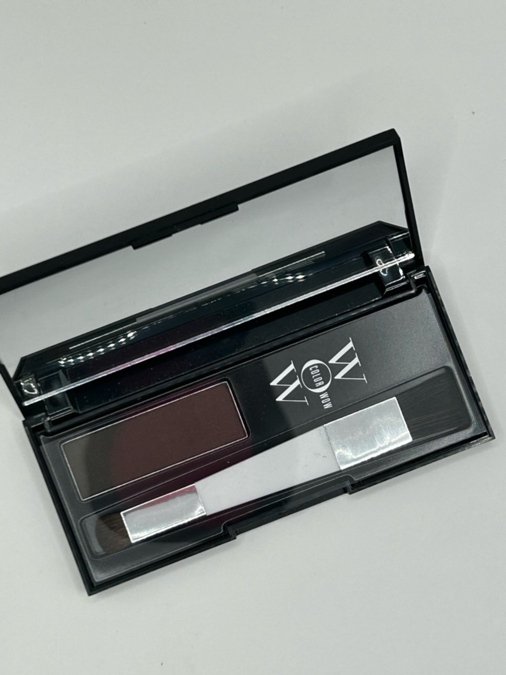 New with no box.

Dark brown.